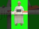 An Omani man from the Gulf working on a tablet computer in his office and thinking about a vacation or the weekend.