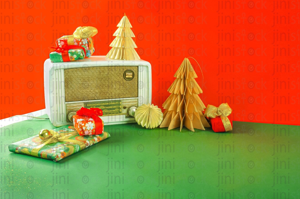 A vintage radio between Christmas and New year ornaments