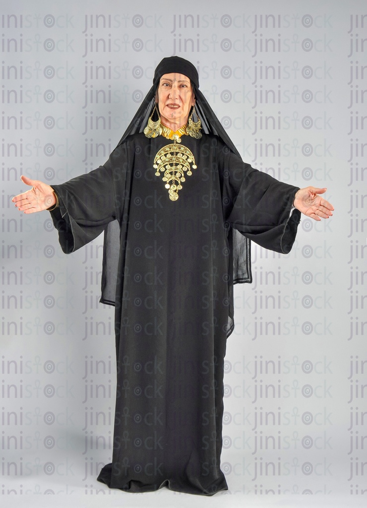 upper Egypt woman  or farmer hugging her grandchildren.