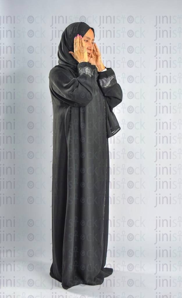 Saudi Arabian or Emirati woman or a woman from the Gulf has a headache