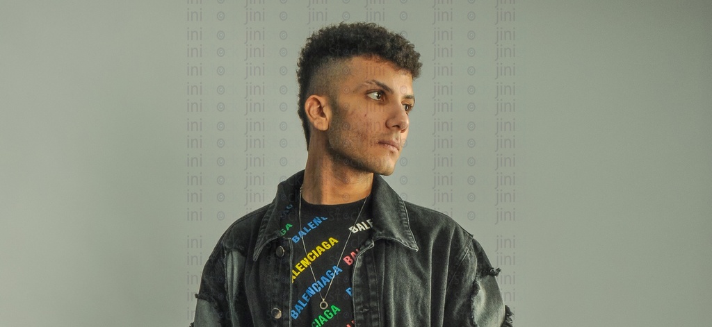 A man with pimples on his face.