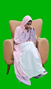 khaliji arab saudi woman from gulf sitting on a chair suffering from cold and sick coughing