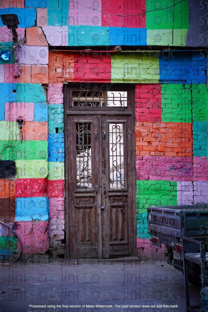 old door vintage historic in a colourful wall