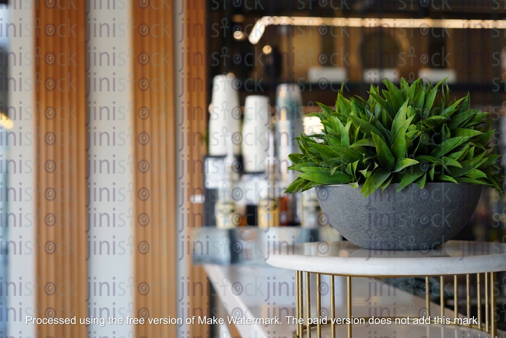 lantern in gold and coloured glasses on a wall