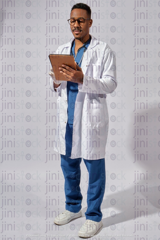 egyptian doctor checking the ipad working