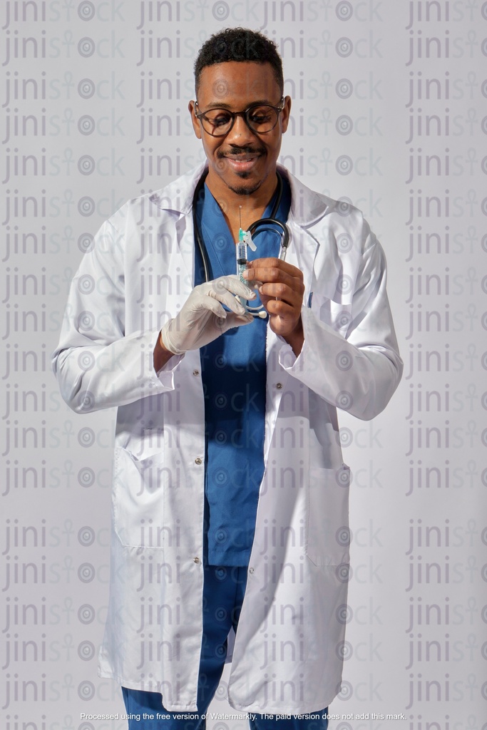 Egyptian doctor holding a syringe