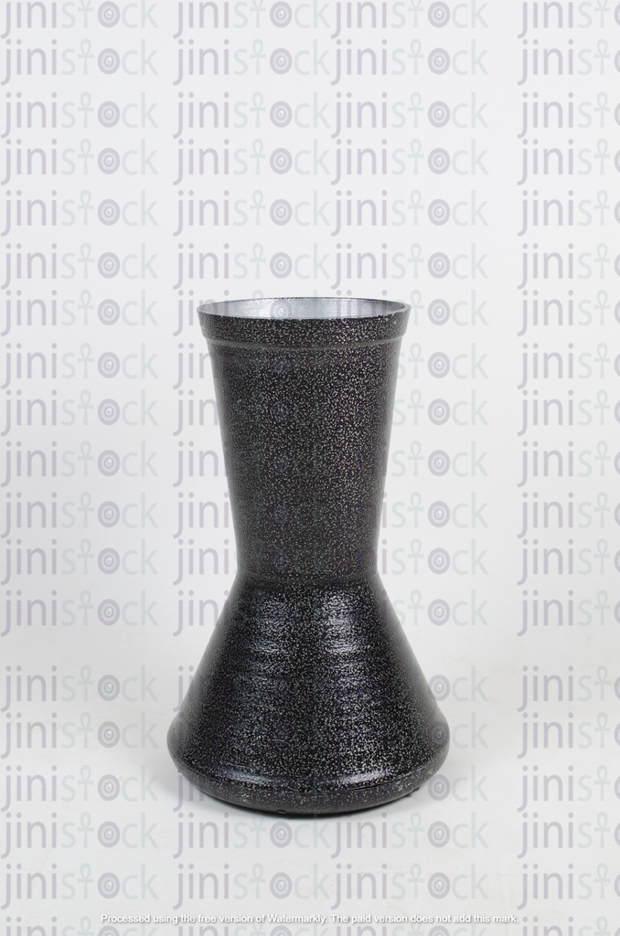 drum placed vertically, face down 