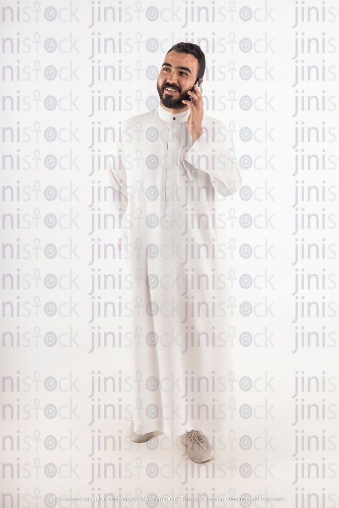 a gulf business man from saudi khaliji talking on mobile on isolated background stock image with high quality