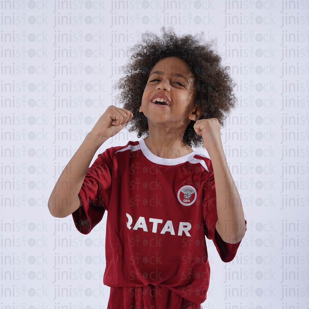 khaliji Qatar boy cheering for his football team