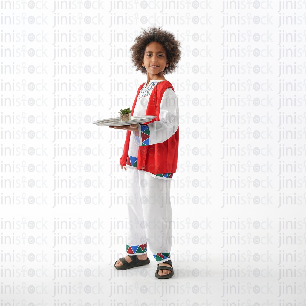 nubian egyptian boy with curly hair looks like bakr and holding a book and looking at the camera