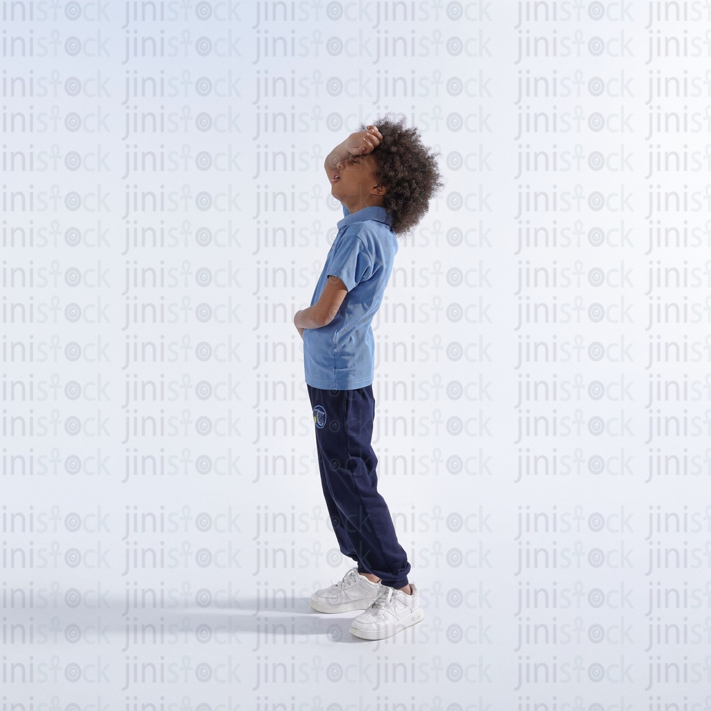 tried and  sick young boy with curly hair