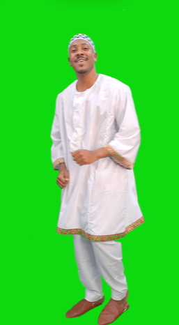 A Nubian Egyptian man wearing Nubian uniform and dancing cheerfully