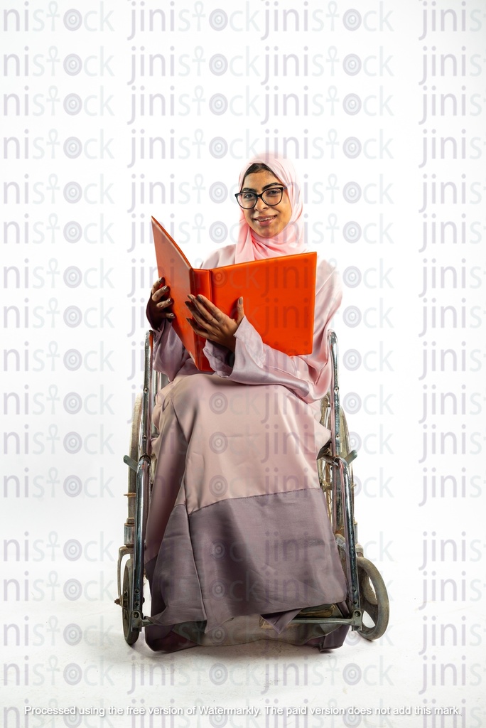 saudi khaliji woman on a wheelchair and working checking something in a folder or a file