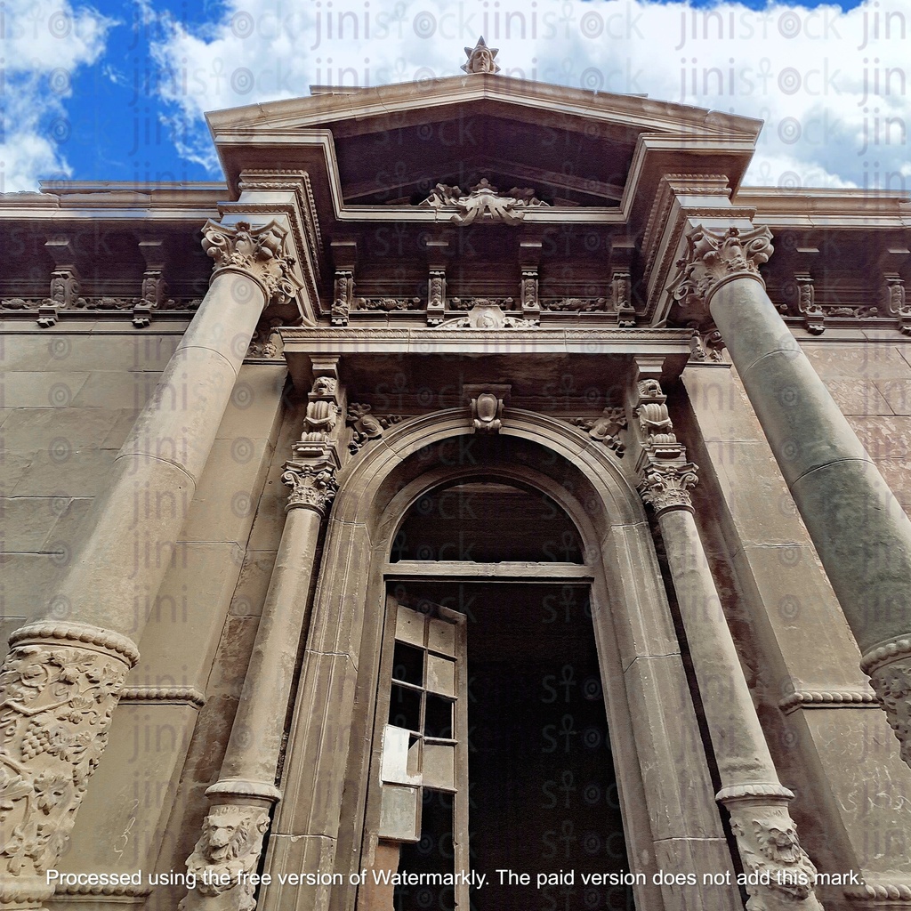 a high door way in a historic palace