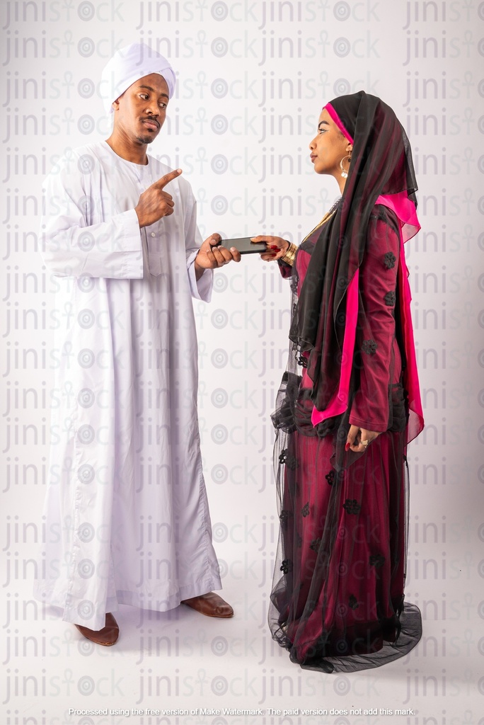 Nubian man and woman Egyptians arguing about phone privacy