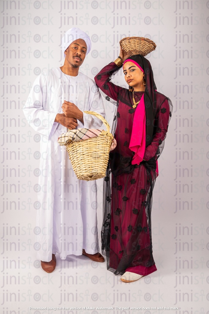 Nubian man and woman standing looking at the camera
