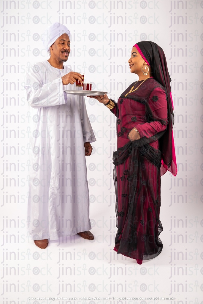 Nubian wife serving tea to her Egyptian Nubian husband