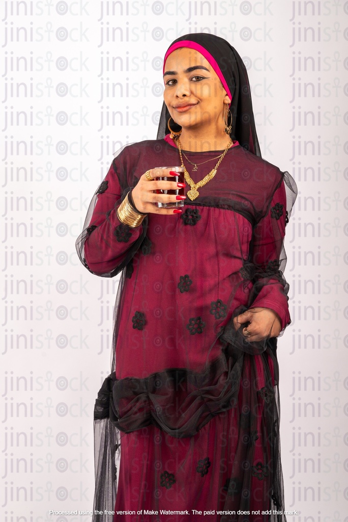 nubian woman drinking tea