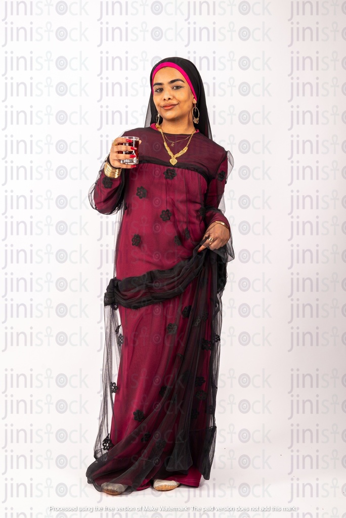 Nubian woman from Egypt drinking tea