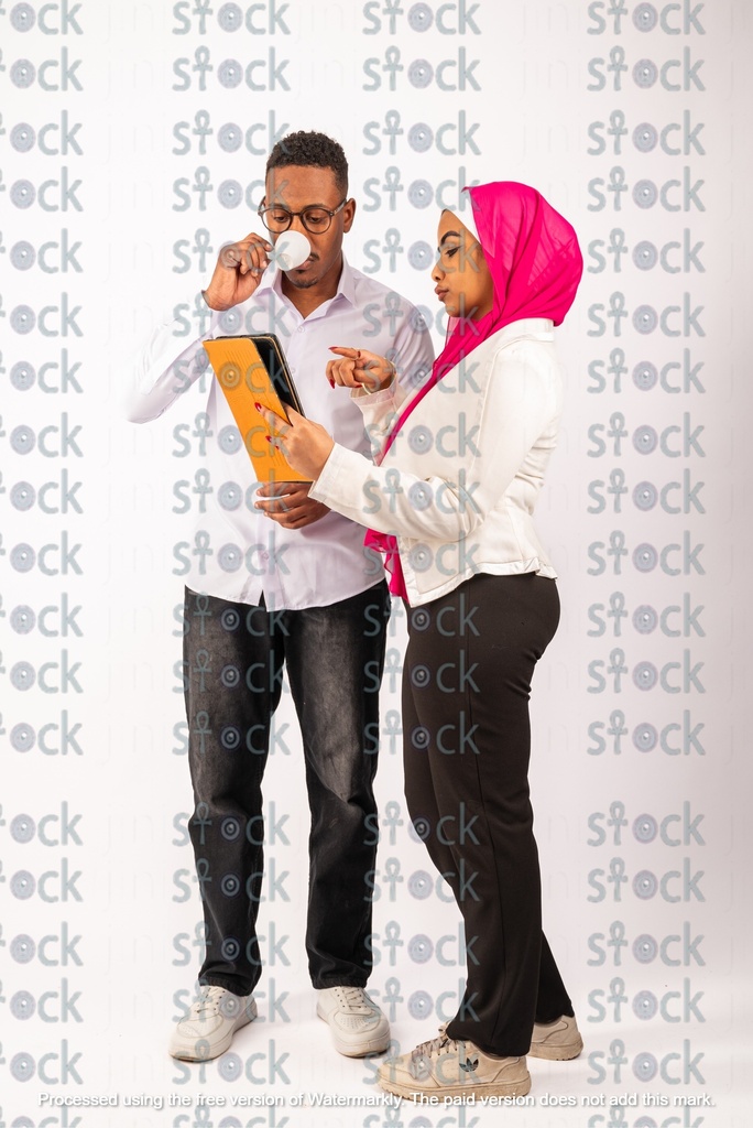 A veiled girl talking to a Nubian young man drinking coffee