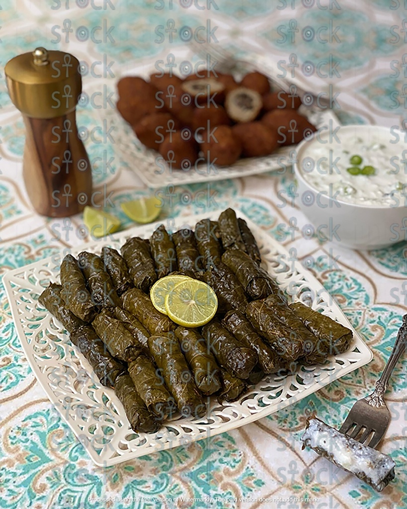 Stuffed grape leaves decorated with lemon slices