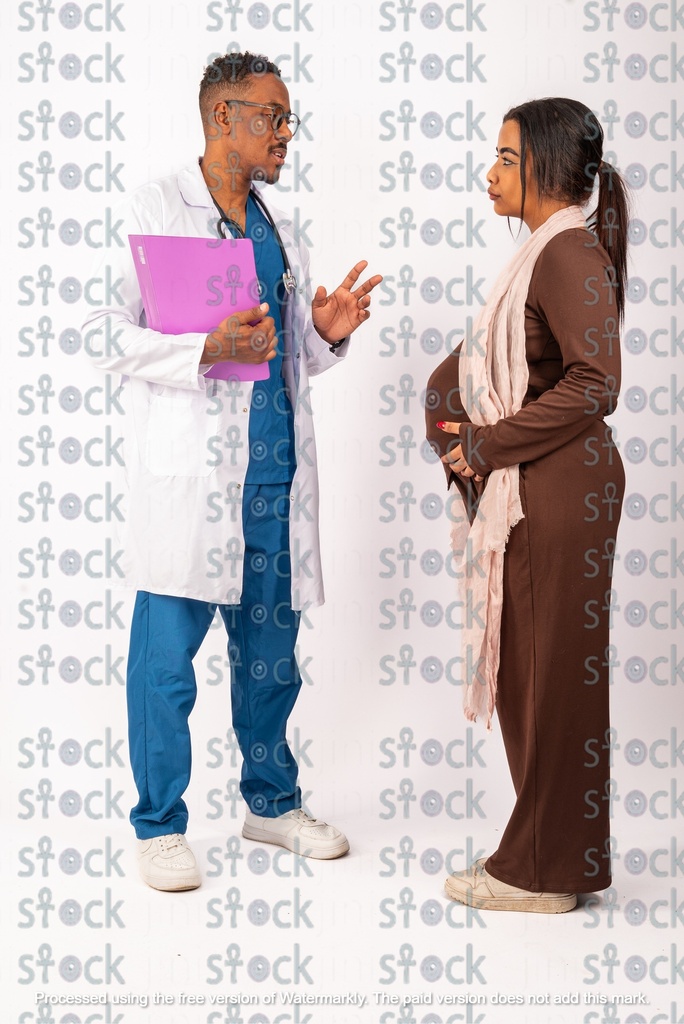 The doctor is holding a pink file to diagnose the mother's condition