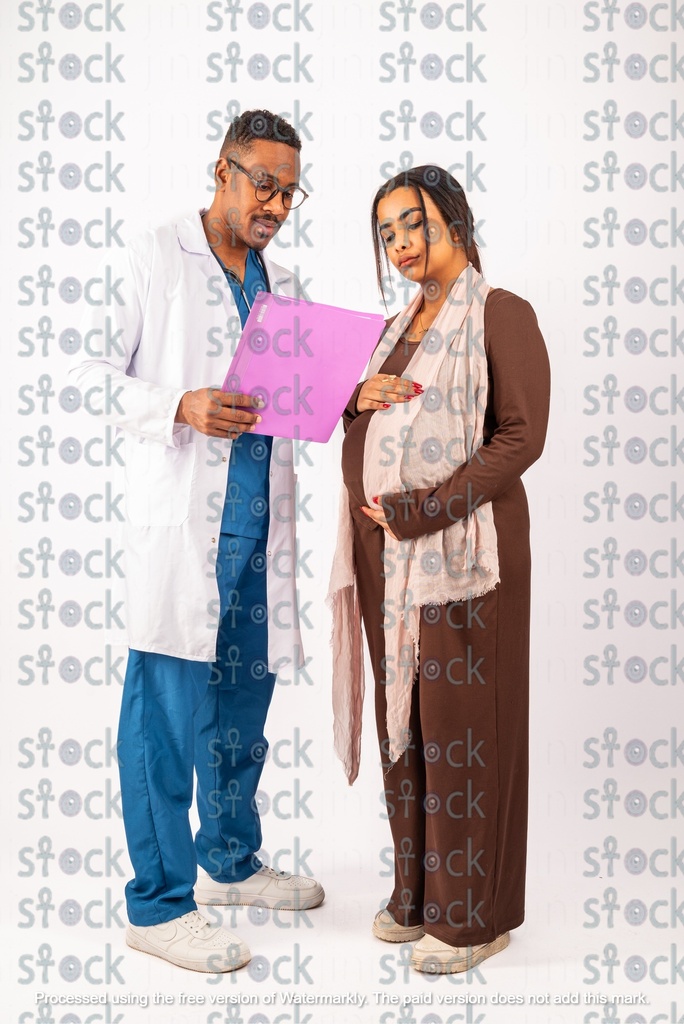 Mother and doctor looking at the file