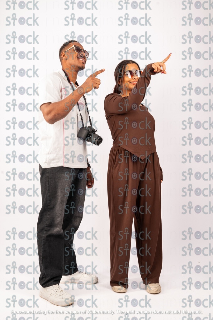 Nubian youth pointing something out