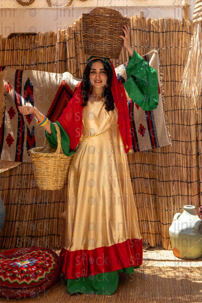 Egyptian peasant woman wearing colorful clothes 