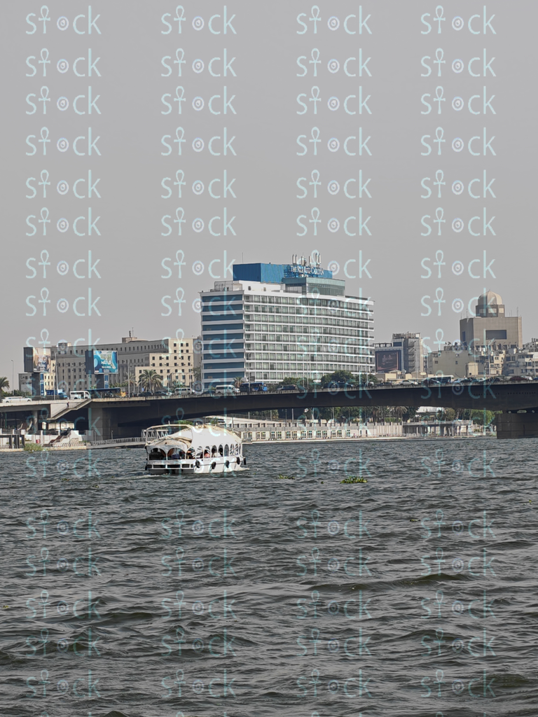 View of Qasr El Nil Bridge with prominent hotels in the background 