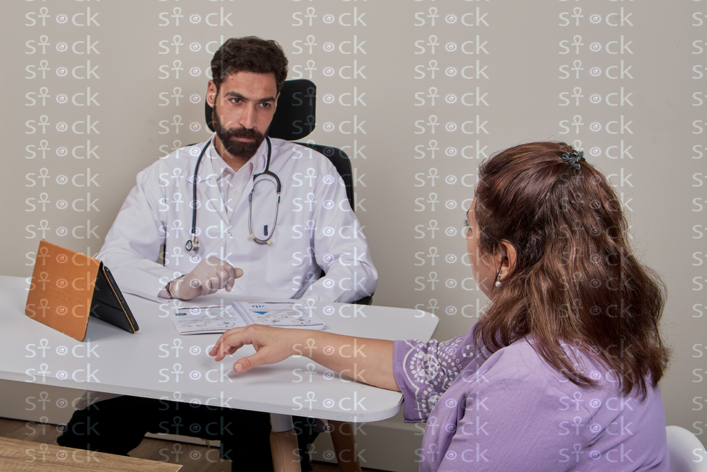 Doctor listening to patient’s concerns