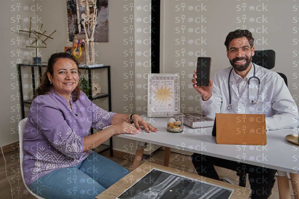 Doctor and patient at desk