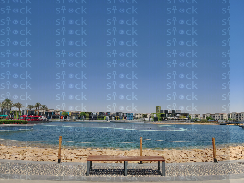 Lake panorama with distant buildings