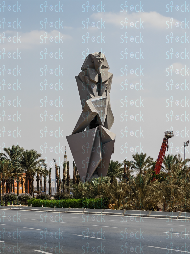 Tall Diaa Awad stone statue