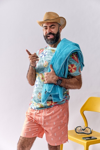 man in summer outfit pointing at something.