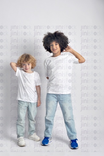 Two curly hair little boys smiling