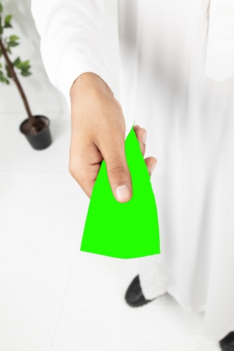  A young Gulf man holds money that can be modified to the required green color