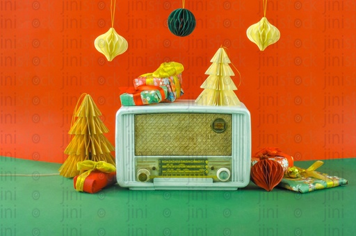 A vintage radio between Christmas and New year ornaments