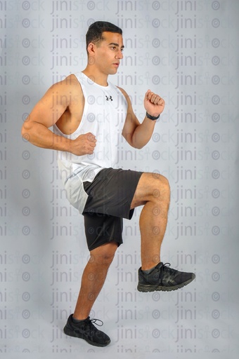 Young athlete playing sport or working out in a gym