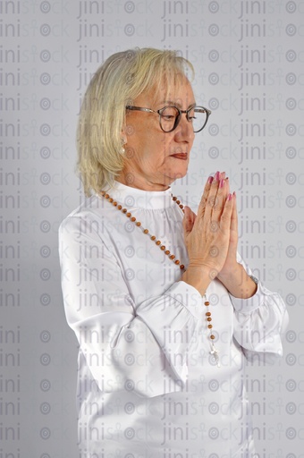 A Christian Egyptian woman praying.