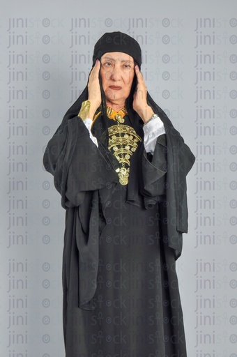 An upper Egypt woman has a headache.