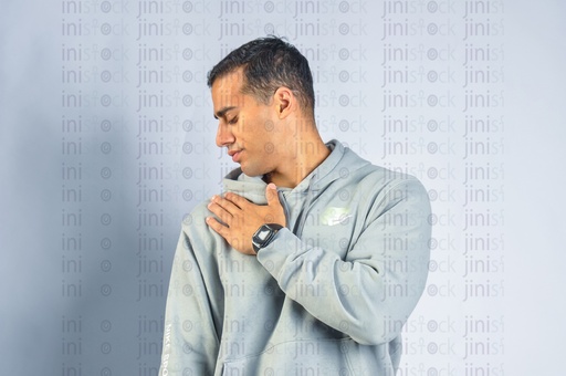 A young man suffering from dandruff