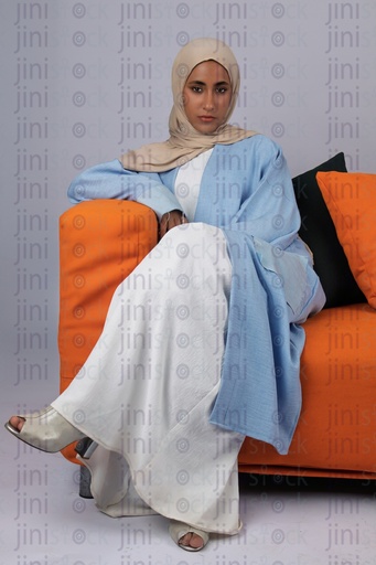khaliji saudi arab woman from gulf sitting on the couch