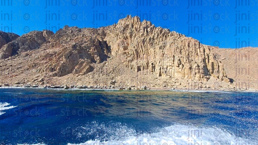 Red sea, mountains, and sea water splash in Dahab in South Sinai, Egypt