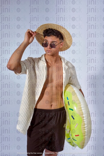 Egyptian man wearing hat and carrying water floater