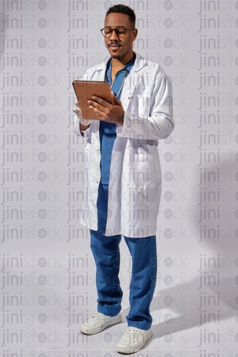 egyptian doctor checking the ipad working