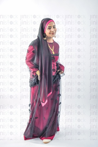 A Nubian Egyptian girl wearing Nubian clothes dancing