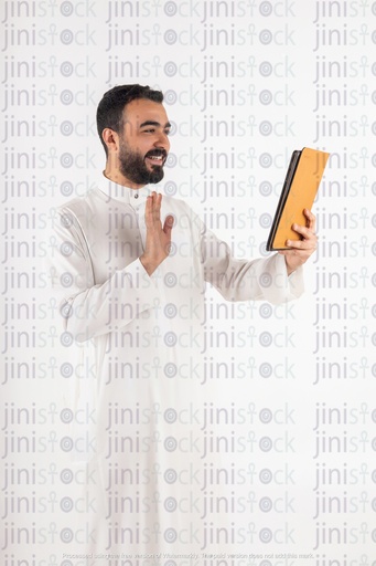 khaliji saudi man from gulf making a video conference stock image on isolated background