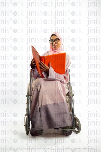 saudi khaliji woman on a wheelchair and working checking something in a folder or a file