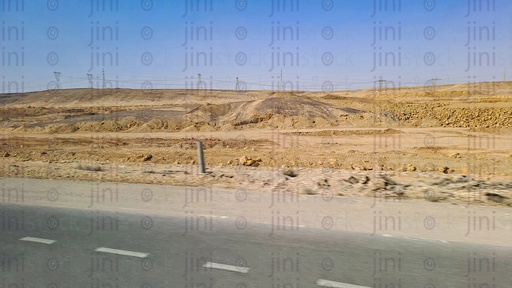 Mountains and an empty Road with no cars or buses on a traveling road in Egypt